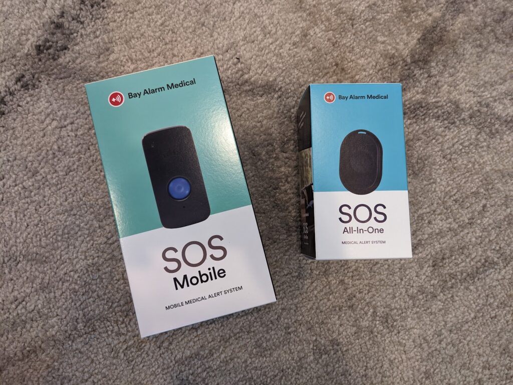 packaging boxes of sos mobile and sos all in one from bay alarm medical