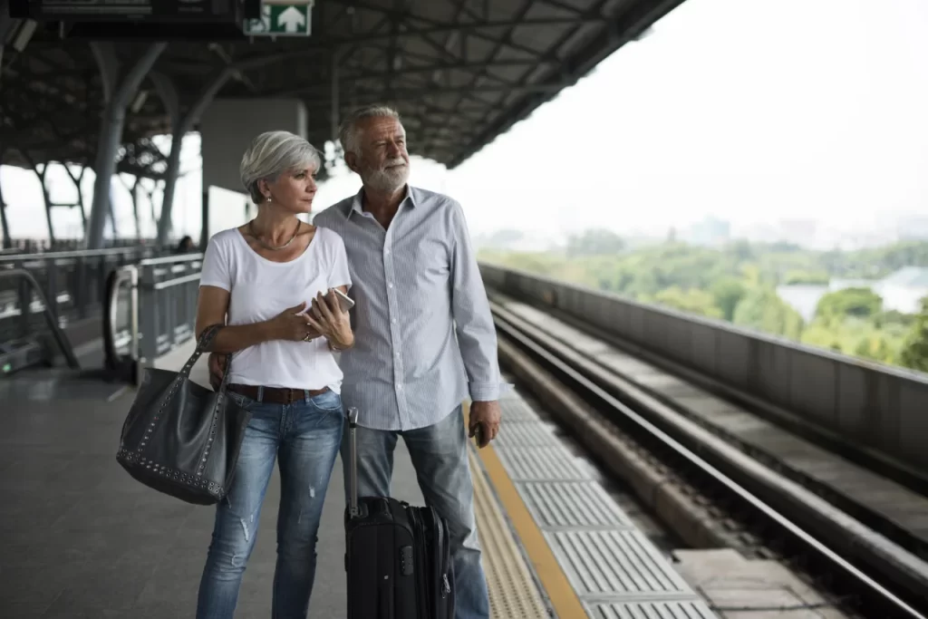 elderly-couple-on-train-platform